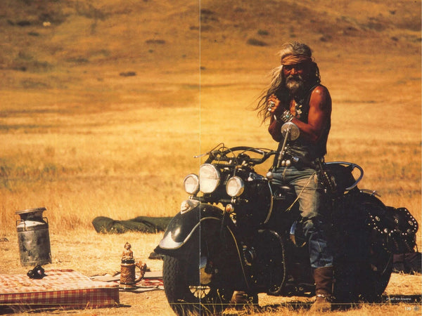 goro takahashi on motorcycle in the meadow
