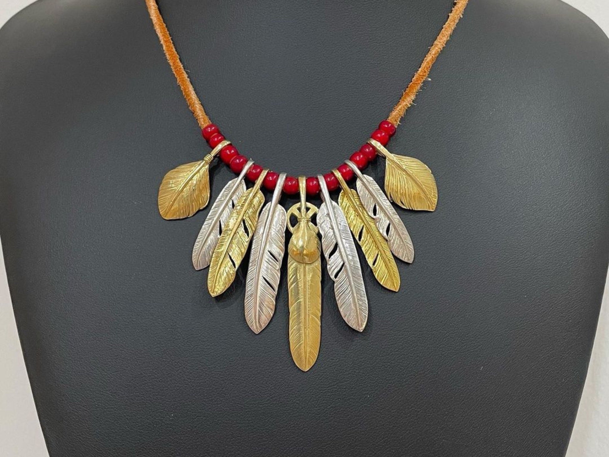 goro's | Feather Pendants | DELTAone International – goro's