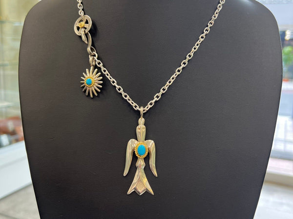 goros gold rope turquoise bird pendant setup with goros sea urchin pendant