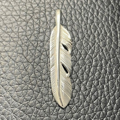goros DELTAone International Silver Feather Left S 62939a 1